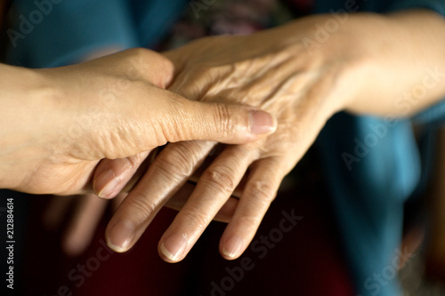 Hands of elderly woman with alzheimer