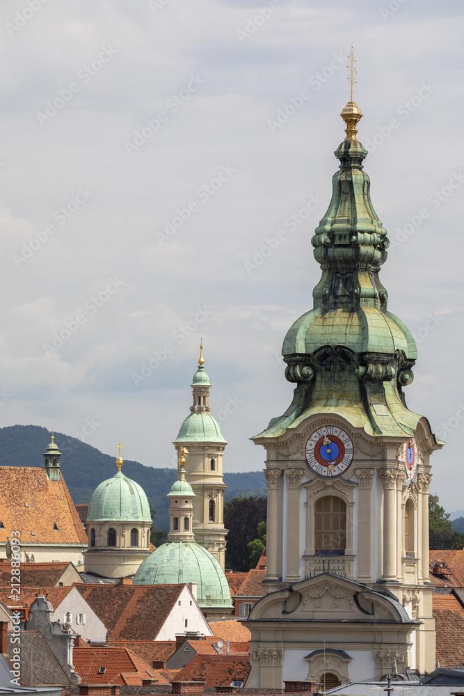 roof scape  with tower stadtpfarrkirche in the city of graz, austria