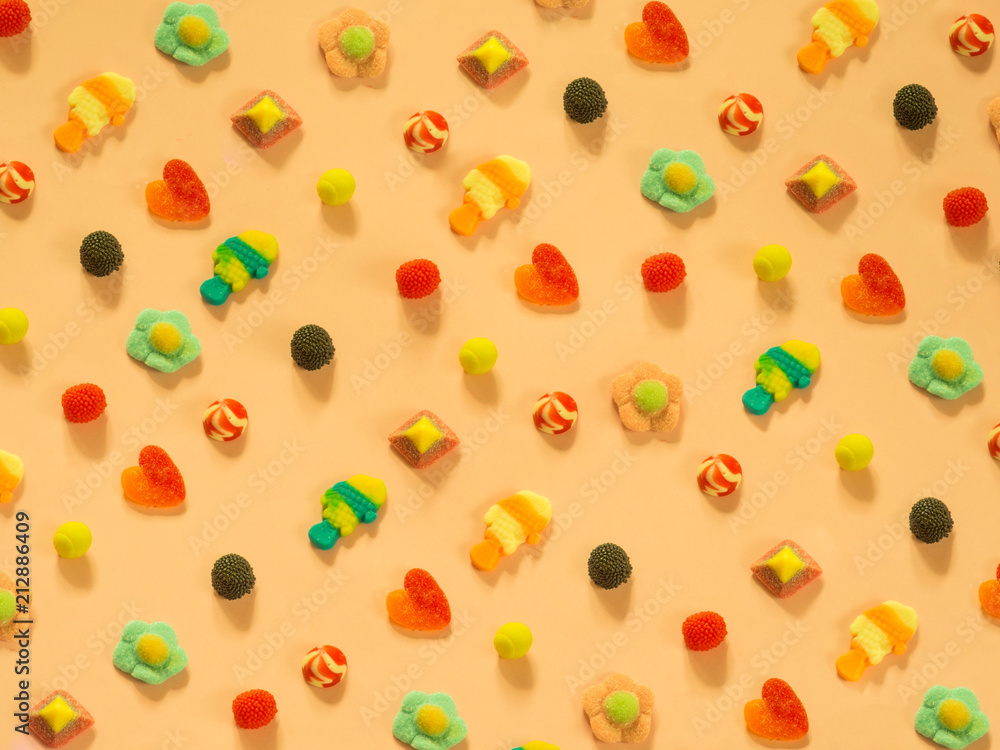 Jelly candies pattern on cream background Jelly candies pattern on cream background