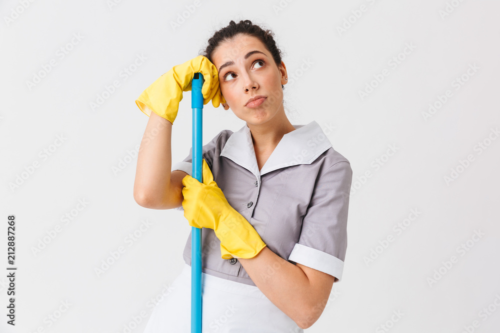 Portrait of a thoughtful young housemaid Portrait of a thoughtful young housemaid