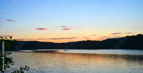 Panorama of an bohemian lake near Cheska Lipa with a boat