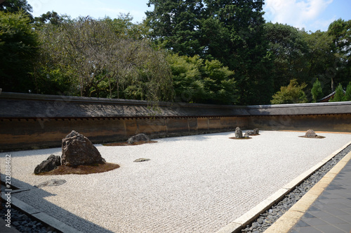 Ryonn-ji Is famous with their rock garden. It is impossible to view all 15 stones at once from any angle of the terrace. photo