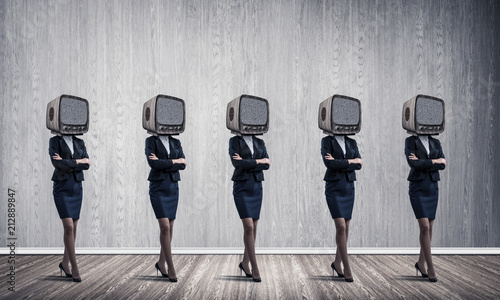 Business women with old TV instead of head.