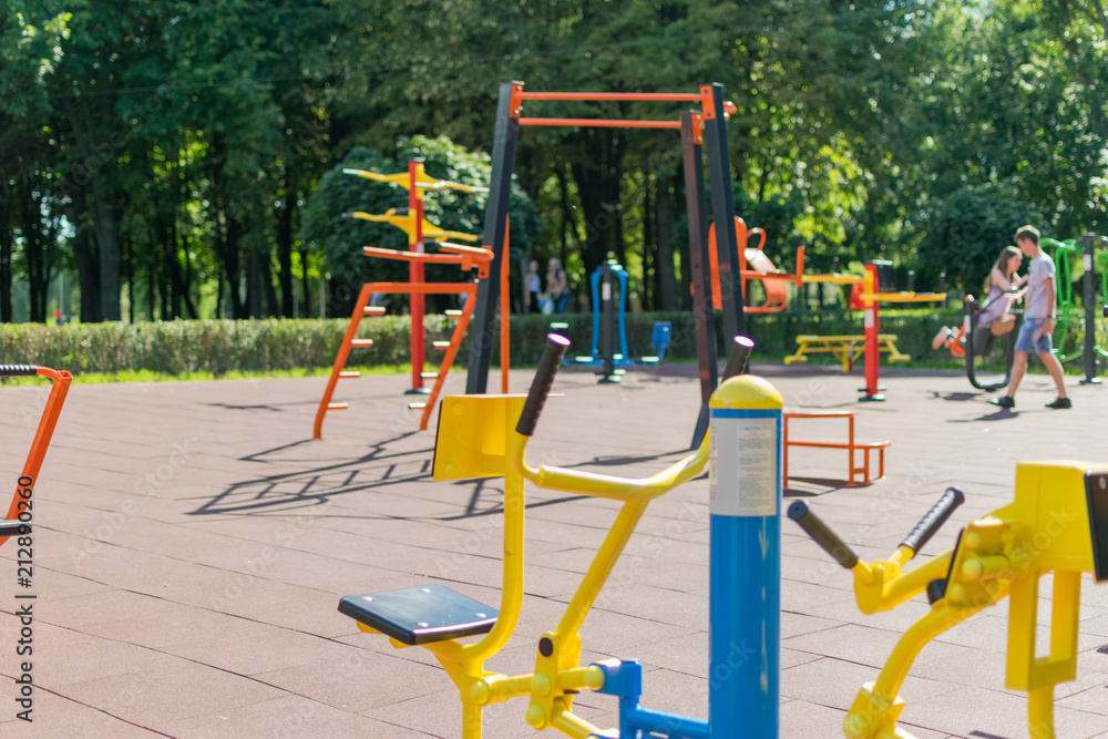 Kiev, Ukraine, -07 July, 2018: Playground with sports simulators in the park. Kiev, Ukraine, -07 July, 2018: Playground with sports simulators in the park.