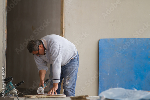 bricklayer at work in a building site