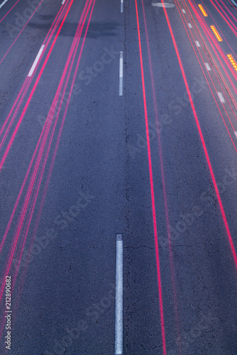 red trails on asphalt