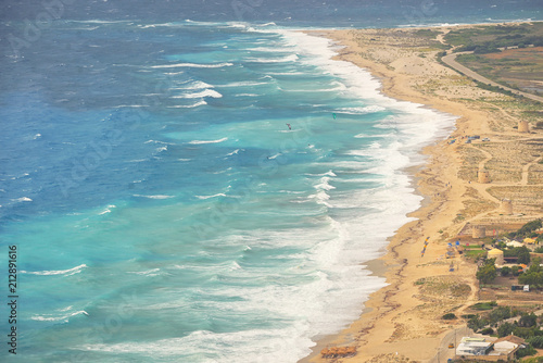 Surfing the turquoise waters of Lefkada