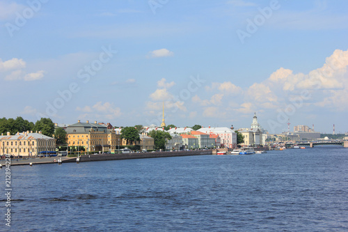 St. Petersburg City Skyline Architecture on Summer Day in Russia. Cityscape View of Universitetskaya Embankment with Antique Classic House Fronts and Neva River Water. Colorful Saint Petersburg Image.