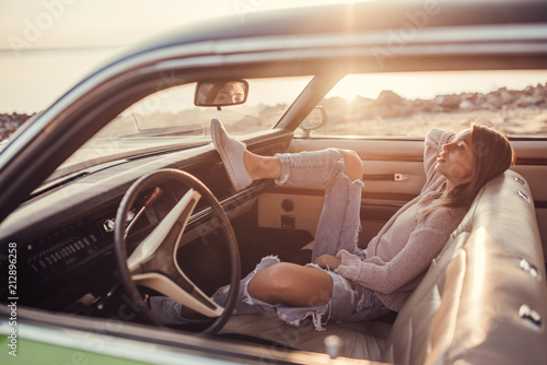 Woman with retro car