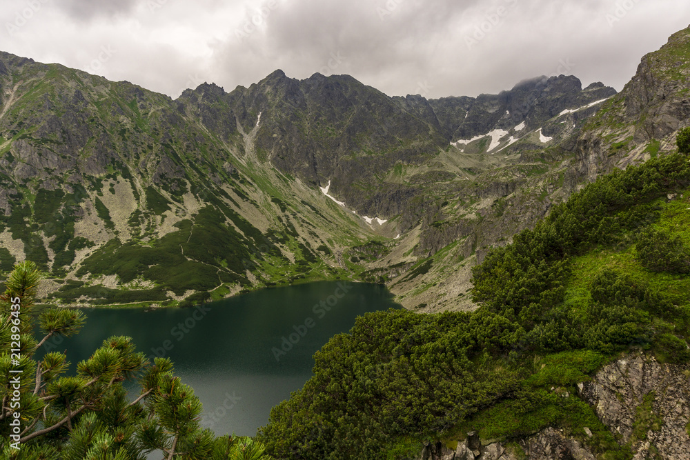 Black Pond Gasienicowy and surrounding peaks. High Tatra Mountains. Poland.
