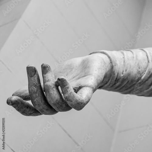 Stone statue detail of human hand