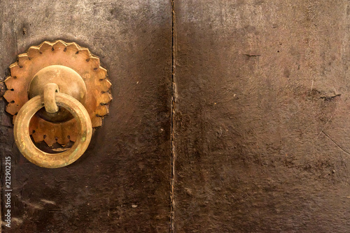 Old vintage white doorknob in India photo