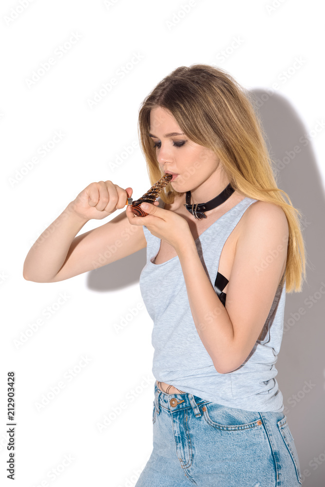 addicted young woman smoking cannabis with pipe on white addicted young woman smoking cannabis with pipe on white