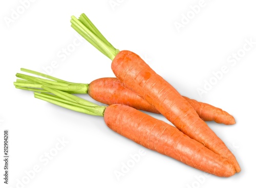 Fresh carrots on a white background