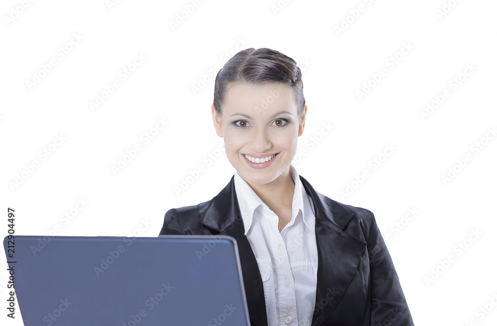 successful business woman is standing with an open laptop successful business woman is standing with an open laptop