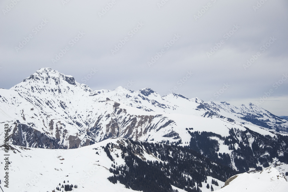 some time spent in switzerland alps while skiing, mostly cloudy weather, but beautiful landscape view of mountain peaks some time spent in switzerland alps while skiing, mostly cloudy weather, but beautiful landscape view of mountain peaks