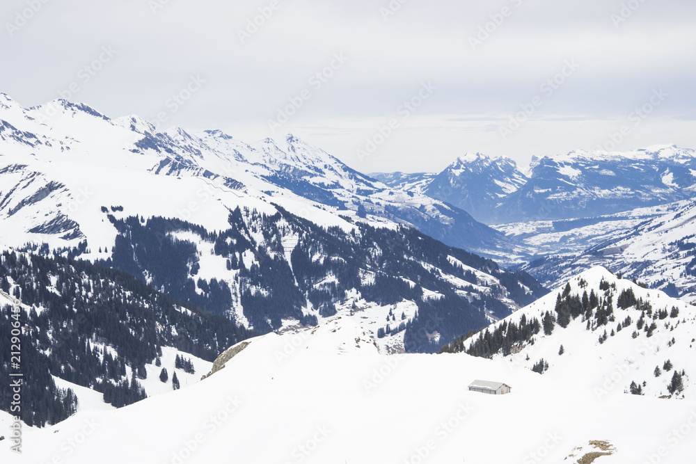 some time spent in switzerland alps while skiing, mostly cloudy weather, but beautiful landscape view of mountain peaks