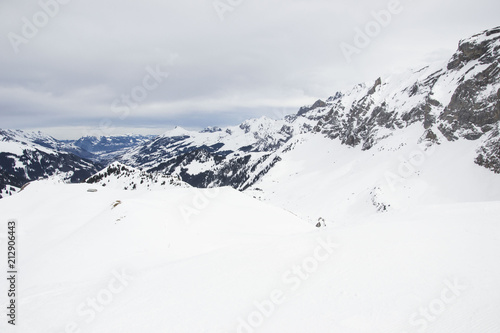 some time spent in switzerland alps while skiing, mostly cloudy weather, but beautiful landscape view of mountain peaks