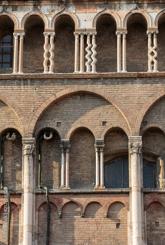 the side wall of Ferrara cathedral, Basilica Cattedrale di San Giorgio, Ferrara, Italy the side wall of Ferrara cathedral, Basilica Cattedrale di San Giorgio, Ferrara, Italy