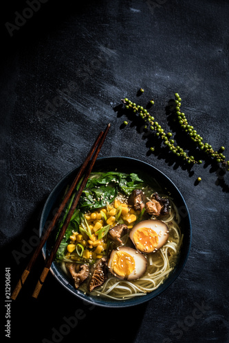 Ramen noodle bowl with egg and corn