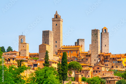 San Gimignano - medieval town with many stone towers, Tuscany, Italy. Panoramic view of cityscape. photo