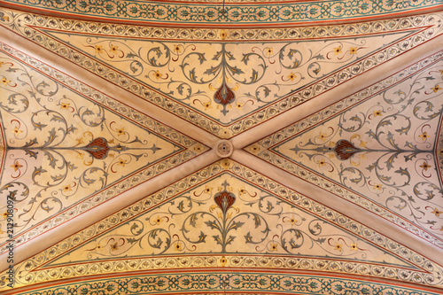 REGGIO EMILIA, ITALY - APRIL 14, 2018: The floral ceiling fresco in church chiesa di San Francesco from 19. cent.