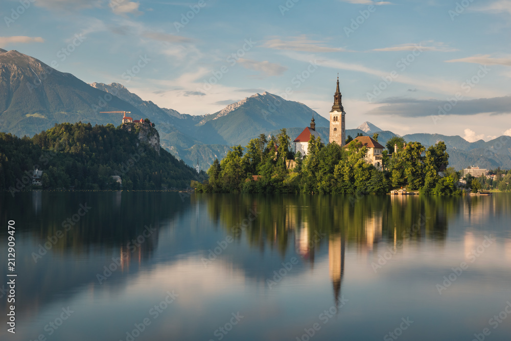 Church on the island on Lake Bled and his reflection in water, Slovenia