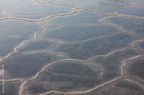 Thin ice on the river, on the sea. photo