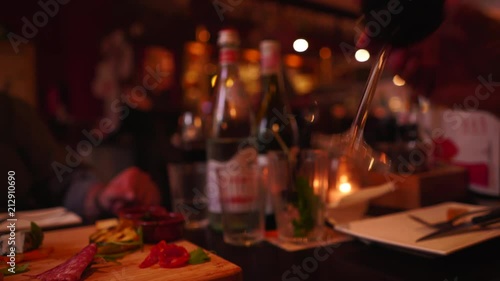 Drinking Red Wine from Table Shallow Depth of Field