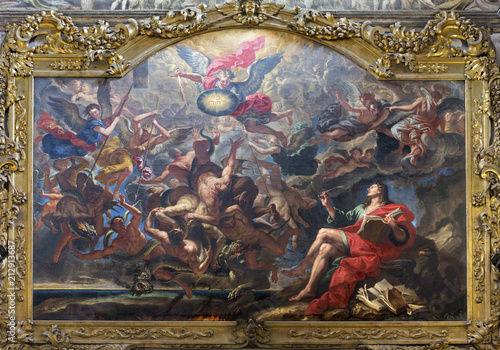 PARMA, ITALY - APRIL 15, 2018: The painting of The Battle of the Angels after Apocalypse of St. John in church Chiesa di San Giovanni Evangelista by unknown artist. photo