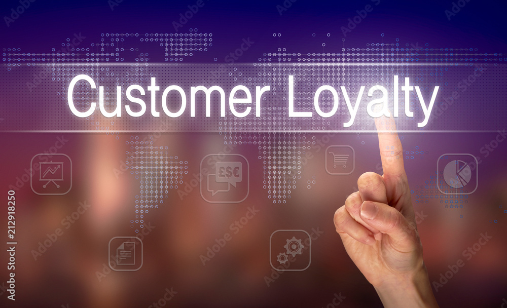 A hand selecting a Customer Loyalty business concept on a clear screen with a colorful blurred background.