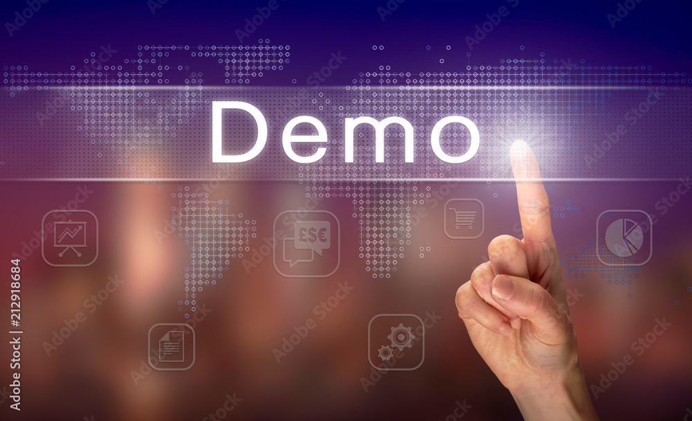 A hand selecting a Demo business concept on a clear screen with a colorful blurred background. A hand selecting a Demo business concept on a clear screen with a colorful blurred background.