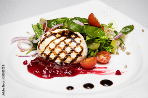 Camembert cheese. Grilled camembert cheese with vegetables
