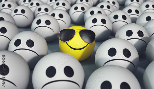 Smiling yellow ball, happiness and sadness