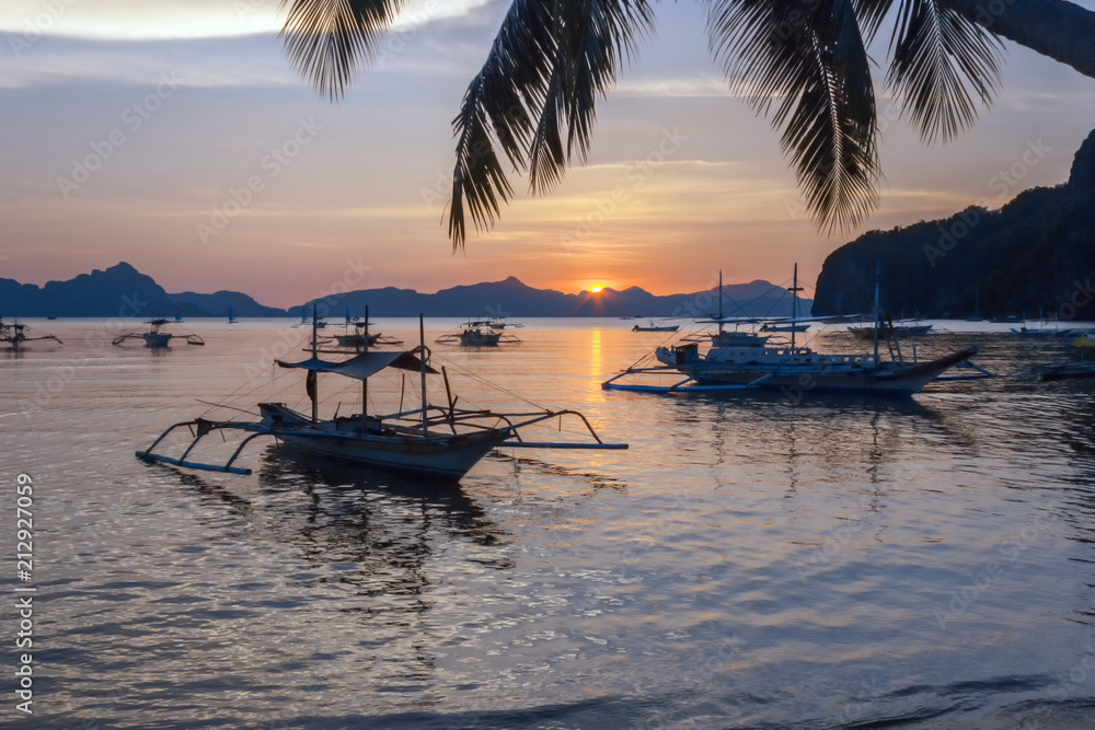  tropical landscape with traditional boats of the Philippines. Elnido, the island of Palawan.