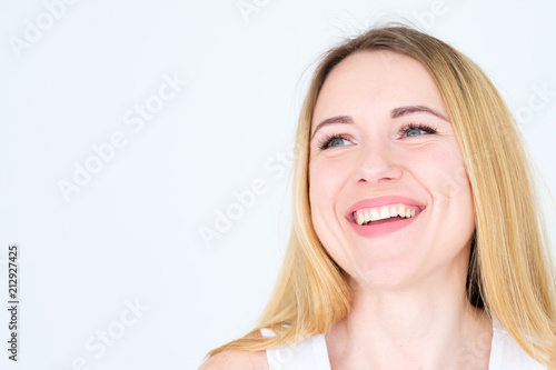 emotion face. happy smiling joyful delighted woman young beautiful blond girl portrait on white background.