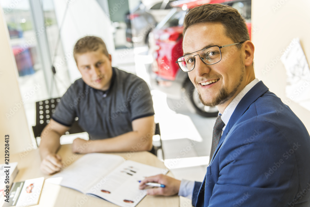 Fototapeta premium Business car seller working with the client