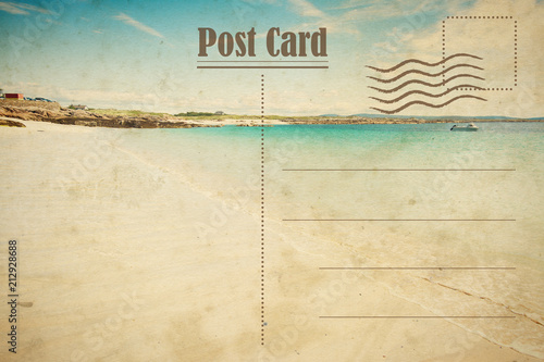 Vintage summer postcard. White sand of beach photo