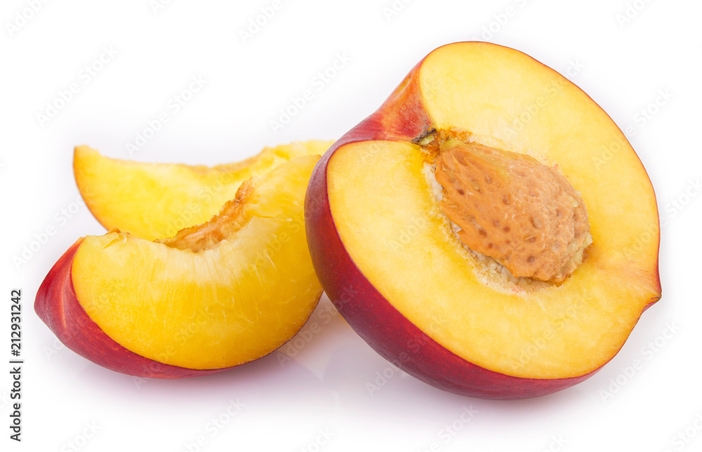 Fresh peaches on white background