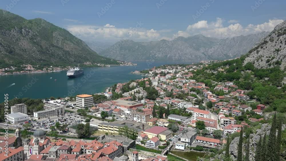 View of Kotor city with the cruise ship at the gulf. Montenegro View of Kotor city with the cruise ship at the gulf. Montenegro