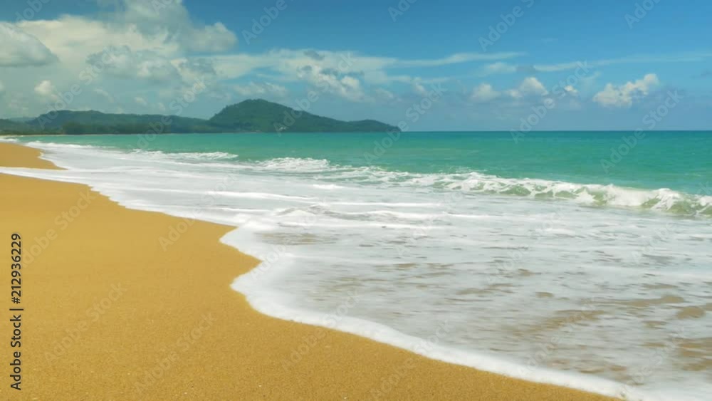 Beautiful blue ocean on sandy beach background with slow motion scene. Beautiful blue ocean on sandy beach background with slow motion scene.
