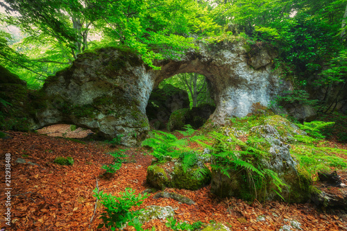 Arno rock arch at Entzia forest in Alava photo