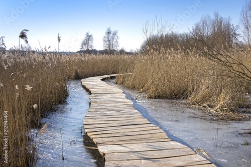 Cold winter day, wooden path in the Uckermark