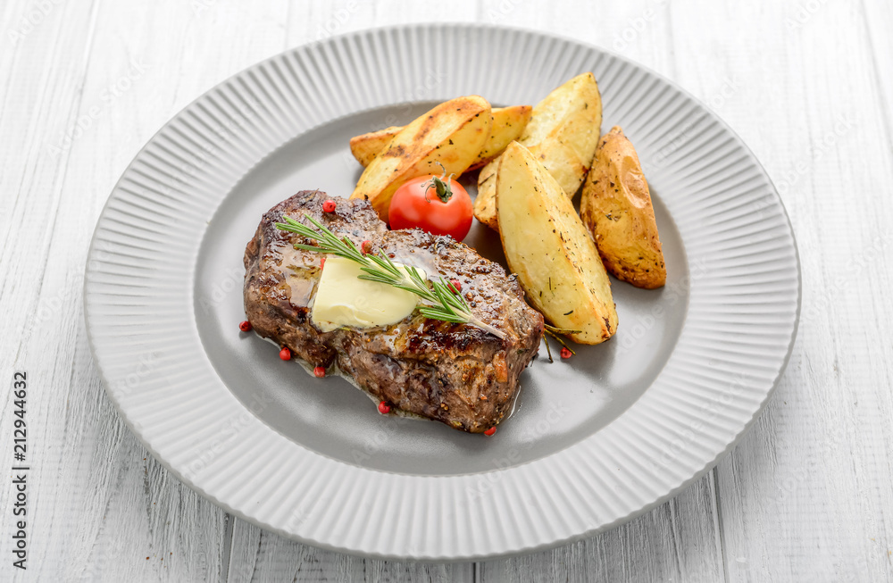 Grilled beefsteak with french fries Grilled beefsteak with french fries