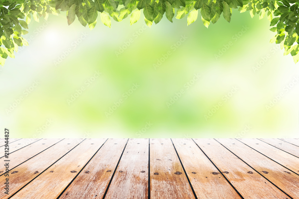 Empty wooden table with party in garden background blurred. Empty wooden table with party in garden background blurred.