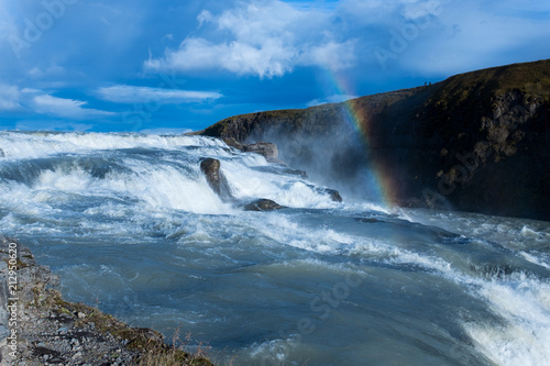 Shot of the Gullfoss Falls with a beautiful rainbow, Iceland.