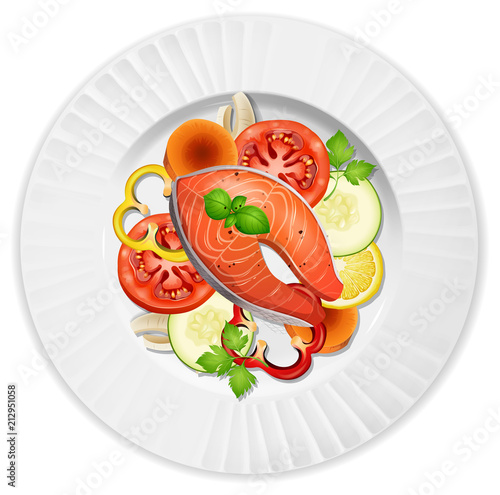 A closeup salmon steak and salad