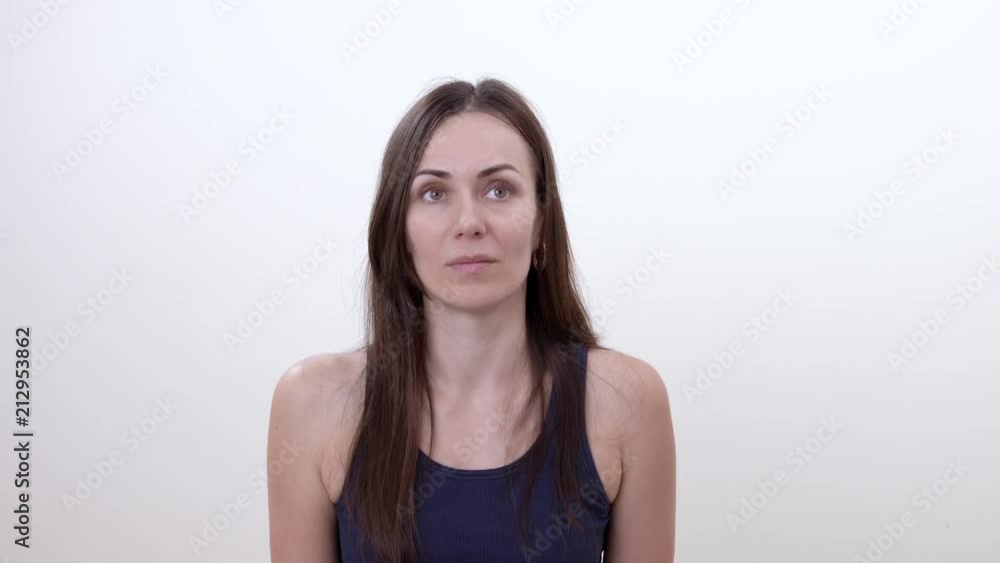 Portrait of consented woman. Isolated on the white background.