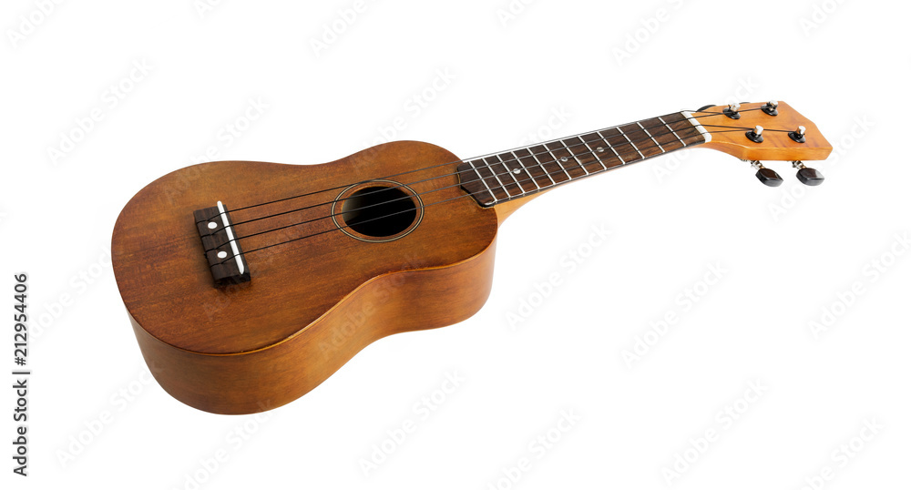 Fototapeta premium The brown ukulele on the white background, with Clipping path