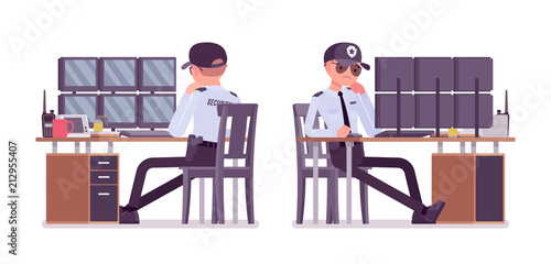 Male security guard monitoring alarm systems